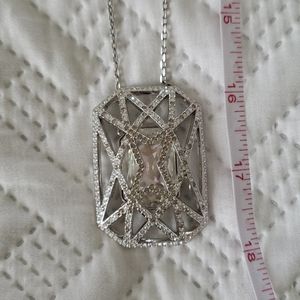 Authentic Swarovski geometric large pendent w attached long neck chain.